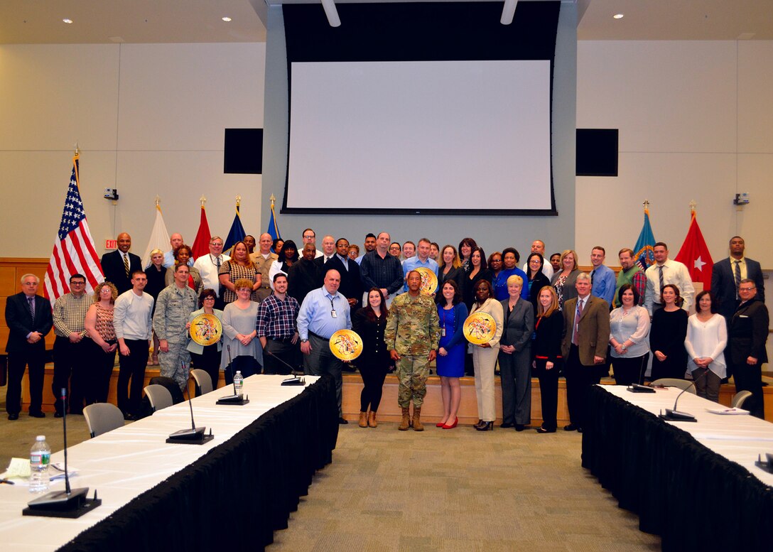 Army Brig. Gen. Charles Hamilton, DLA Troop Support commander (center), stands with the attendees of the Nuclear Enterprise Support Office launch ceremony Feb. 27. The NESO will provide focused support to the Defense Department’s nuclear weapons systems. 
