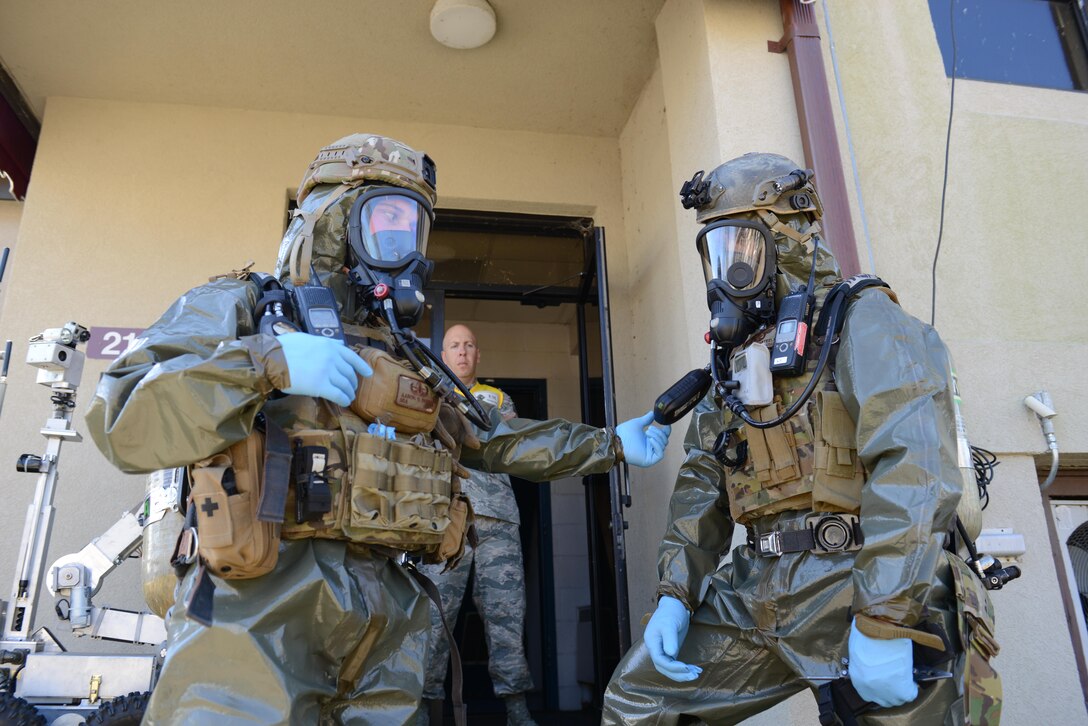 U.S. Air Force Explosive Ordnance Disposal team members respond during a chemical, biological, radiological, nuclear and explosives exercise at Joint Base Langley-Eustis, Va., Feb. 23, 2017. To guarantee the safety of the EOD members, the service members wear protective gear to reduce exposure to CBRNE hazards. (U.S. Air Force photo by Tetaun Moffett)