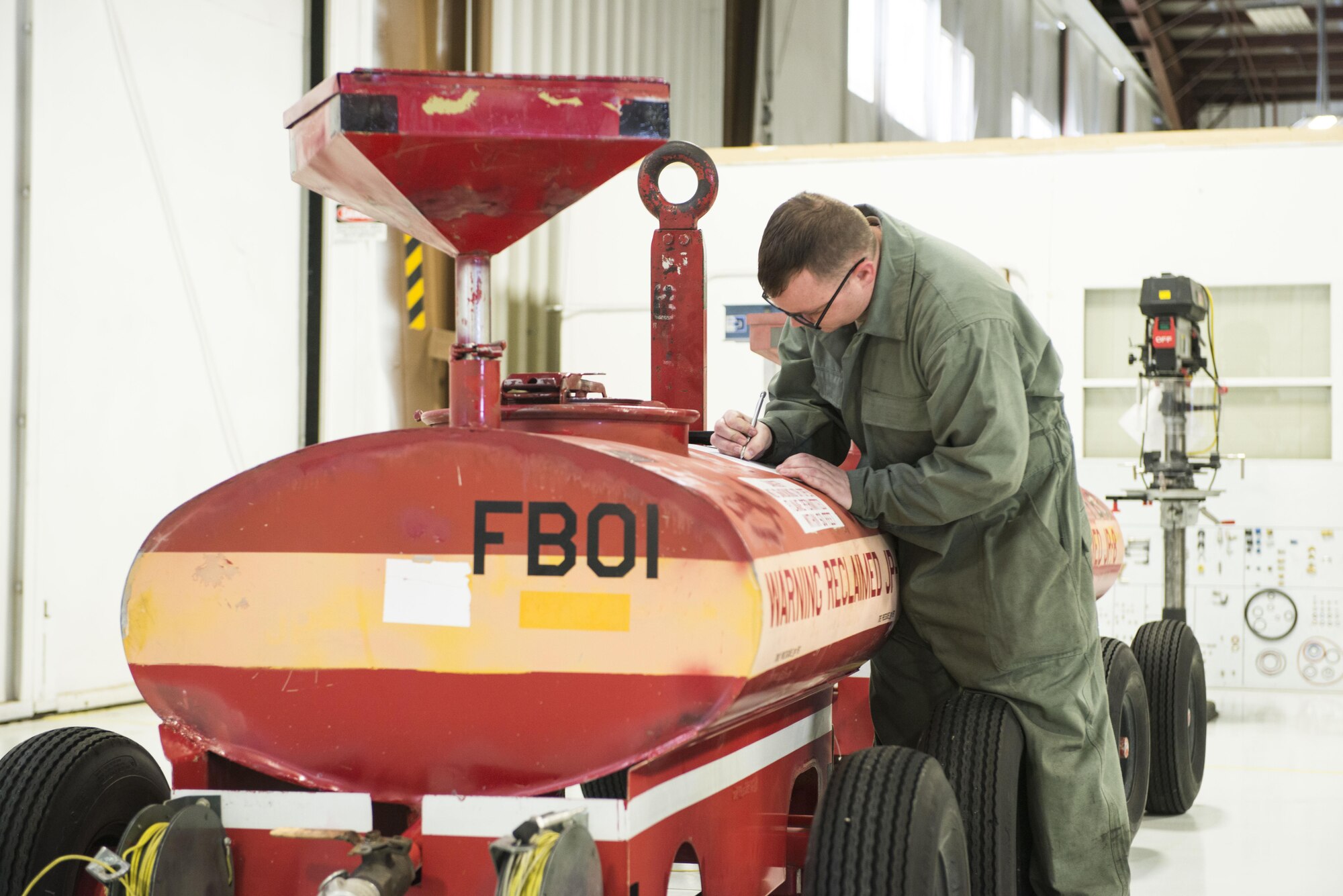 Staff Sgt. David Winans, 366th Aerospace Ground Equipment inspector craftsman, inspects a piece of equipment February 28, 2017, at Mountain Home Air Force Base, Idaho. Inspectors go through and ensure technical orders were followed. (U.S. Air Force photo by Senior Airman Malissa Lott/Released)