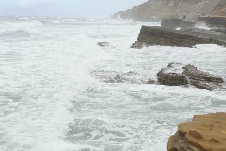 Waves crash into rocks during hightide in San Diego, Calif., Jan. 18, proving that it isn’t always sunny in San Diego. Meteorological and oceanographic Marines are constantly studying weather like this to become more proficient at not only forecasting the weather, but pushing information to 3rd Marine Aircraft Wing squadrons. (U.S. Marine Corps photo by Lance Cpl. Jake M.T. McClung/Released)