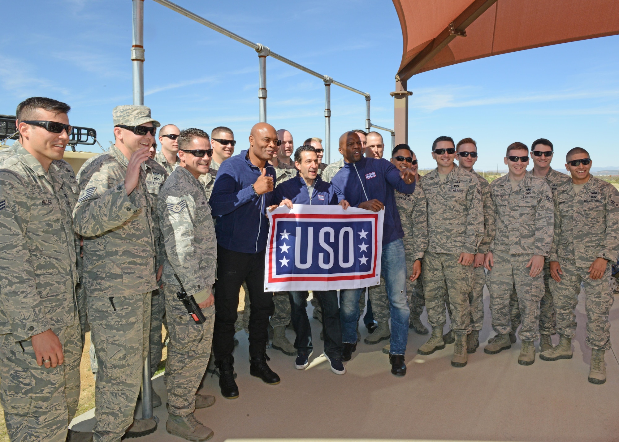 Middle, from left to right: Mixed martial arts fighter Anderson Silva; executive producer David Broome; and actor Terry Crews, pose with Airmen of the 812th Civil Engineering Squadron, Explosive Ordnance Disposal Flight Feb. 24. The celebrity trio were brought to Edwards Air Force Base to debut a new Netflix show called the "Ultimate Beastmaster." (U.S. Air Force photo by Kenji Thuloweit)