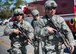 96th Security Forces Squadron Airmen move away from the scene of a simulated detonation after clearing the building during an exercise at the 7th Special Forces Group compound Feb. 23 at Eglin Air Force Base, Fla. The simulated detonation scenario tested firefighters, security forces and medical emergency response personnel agencies among others. (U.S. Air Force photo/Ilka Cole)