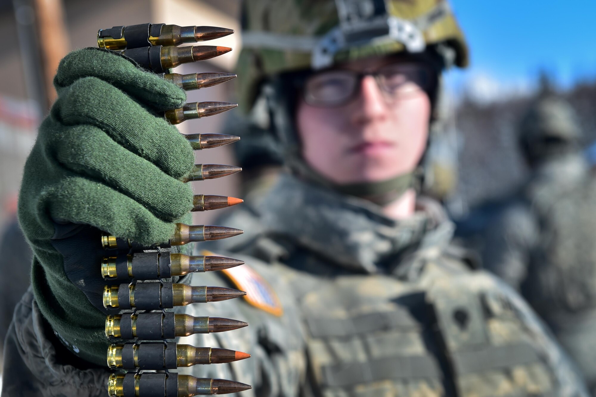 Army Spc. Timothy Sampson, a native of Lancaster, Calif., assigned Delaware Company, 1st Battalion, 501st Parachute Infantry Regiment, 4th Infantry Brigade Combat Team (Airborne), 25th Infantry Division, U.S. Army Alaska, waits to qualify with a M240B machine gun on Grezelka range at Joint Base Elmendorf-Richardson, Alaska, Feb 28, 2017. U.S. Army Alaska is home to the Army’s only Pacific airborne brigade combat team, and maintains the only airborne rapid-response capacity within the Pacific Command. (U.S. Air Force photo/Justin Connaher)