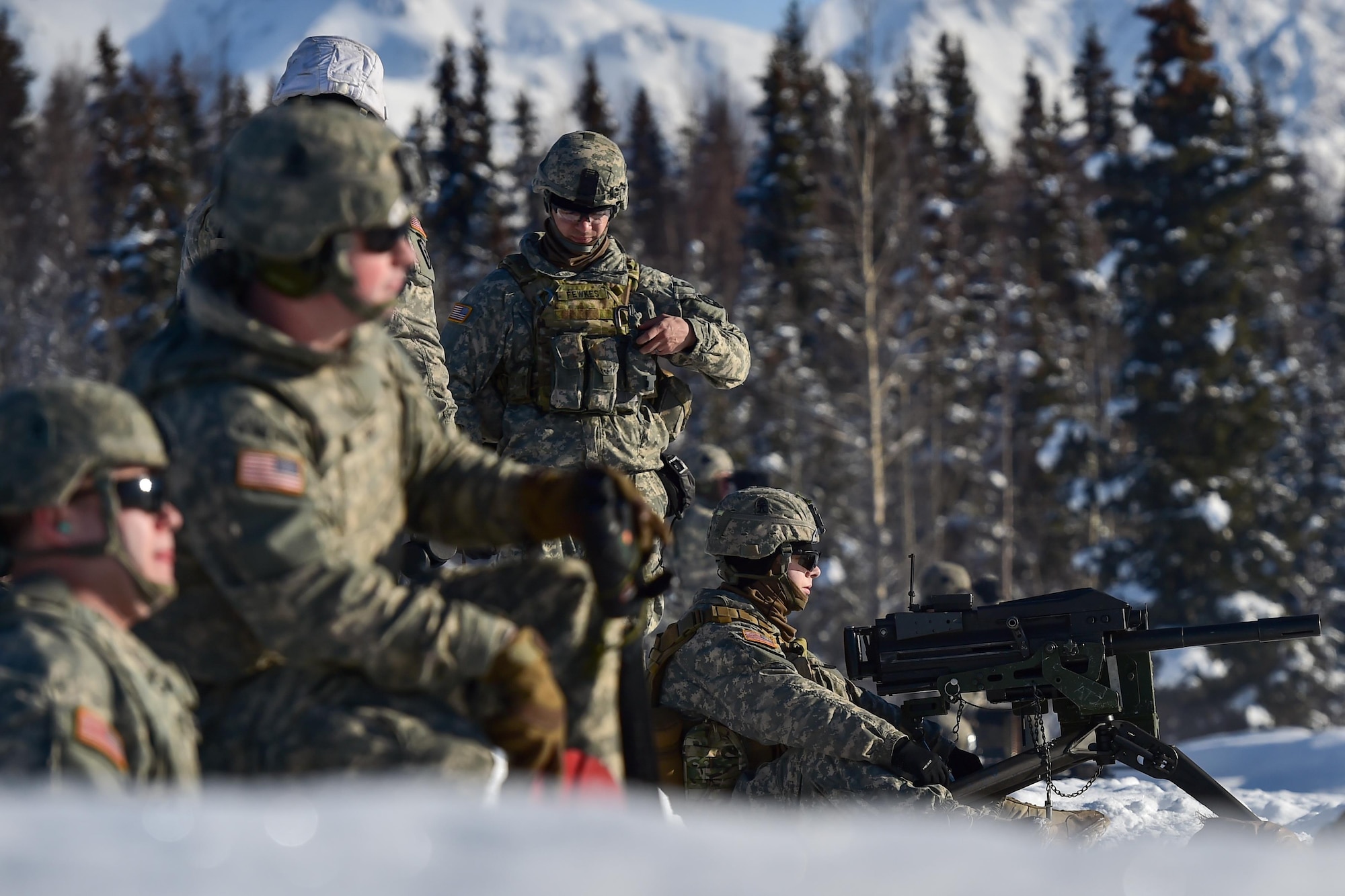 A paratrooper assigned Dog Company, 3rd Battalion, 509th Parachute Infantry Regiment, 4th Infantry Brigade Combat Team (Airborne), 25th Infantry Division, U.S. Army Alaska, waits to qualify with a Mark 19 40mm grenade machine gun on Grezelka range at Joint Base Elmendorf-Richardson, Alaska, Feb 28, 2017. U.S. Army Alaska is home to the Army’s only Pacific airborne brigade combat team, and maintains the only airborne rapid-response capacity within the Pacific Command. (U.S. Air Force photo/Justin Connaher)