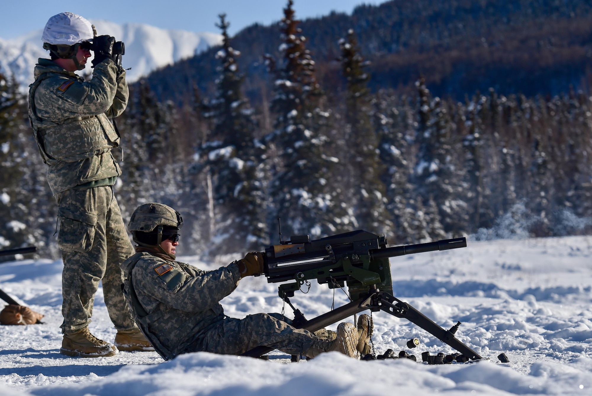 A 9aratrooper assigned Dog Company, 3rd Battalion, 509th Parachute Infantry Regiment, 4th Infantry Brigade Combat Team (Airborne), 25th Infantry Division, U.S. Army Alaska, qualifies with a Mark 19 40mm grenade machine gun on Grezelka range at Joint Base Elmendorf-Richardson, Alaska, Feb 28, 2017. U.S. Army Alaska is home to the Army’s only Pacific airborne brigade combat team, and maintains the only airborne rapid-response capacity within the Pacific Command. (U.S. Air Force photo/Justin Connaher)
