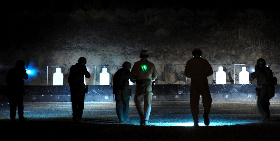 CHESAPEAKE, Va. (February 23, 2017) - Marines assigned to Training Company, Marine Corps Security Force Regiment, observe as students of the Close Quarters Battle course  participate in a live-fire range as part of Close Quarter Battle weapons qualification on Feb. 23, 2017, at Naval Support Activity Northwest Annex, in Chesapeake, Va.  Training Company is part of Marine Corps Security Force Regiment, a unit dedicated to security and counter-terrorism.  (US Navy Photo by Mass Communication Specialist 1st Class Kiona MIller/Released)