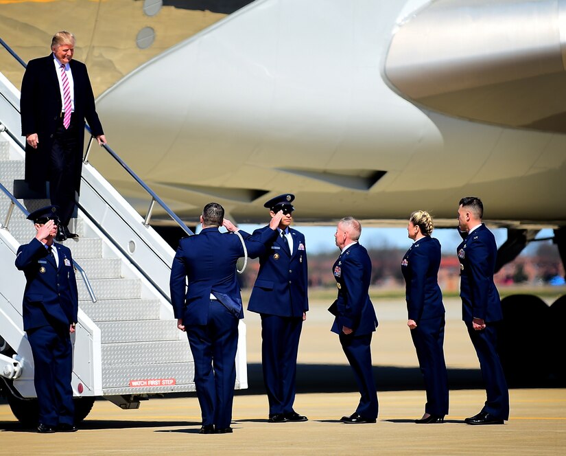 President Donald J. Trump is greeted by Maj. Gen. John K. McMullen, vice commander, Air Combat Command, Col. Caroline Miller, 633rd Air Base Wing commander, and Col. Peter Fesler, 1st Fighter Wing commander at Joint Base Langley-Eustis, Va., March 2, 2017. The 633rd ABW is the host wing to 24,000 Airmen, Soldiers and civilians who support 11 major units, one of which is the 1st FW, whose mission is to deliver stealth, combat airpower world-wide on short notice to combatant commanders. (U.S. Air Force photo by Senior Airman Areca T. Bell)