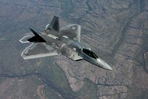 A U.S. Air Force F-22 Raptor flies above Royal Australian Air Force Base Tindal, Australia, March 2, 2017. Twelve F-22 Raptors and approximately 200 U.S. Air Force Airmen participated in the first Enhanced Air Cooperation, an initiative under the Force Posture Agreement between the U.S. and Australia. (U.S. Air Force photo by Maj. Lori Hodge)