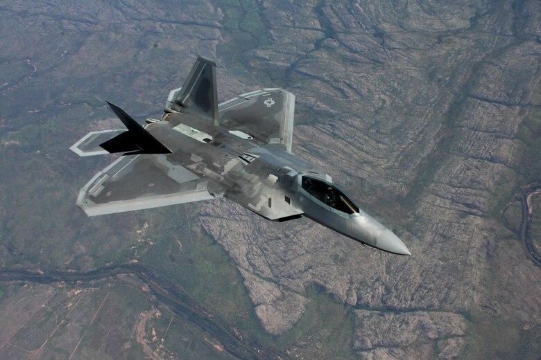 A U.S. Air Force F-22 Raptor flies above Royal Australian Air Force Base Tindal, Australia, March 2, 2017. Twelve F-22 Raptors and approximately 200 U.S. Air Force Airmen participated in the first Enhanced Air Cooperation, an initiative under the Force Posture Agreement between the U.S. and Australia. (U.S. Air Force photo by Maj. Lori Hodge)