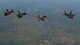 Four U.S. Air Force F-22 Raptors assigned to the 90th Fighter Squadron fly in formation in the skies above Royal Australian Air Force Base Tindal, Australia, March 2, 2017. Twelve F-22 Raptors and approximately 200 U.S. Air Force Airmen participated in the first Enhanced Air Cooperation, an initiative under the Force Posture Agreement between the U.S. and Australia. (U.S. Air Force photo by Staff Sgt. Alexander Martinez)