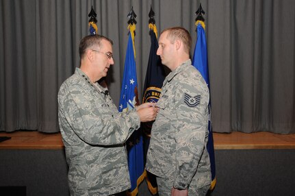 U.S. Air Force Gen. John E. Hyten, commander of U.S. Strategic Command (USSTRATCOM), presents the Purple Heart Medal to U.S. Air Force Tech Sgt. Benjamin L. Clark, USSTRATCOM logistics directorate non-commissioned officer in charge of logistics management, at USSTRATCOM headquarters, Offutt Air Force Base, Neb., Mar. 1, 2017.  Clark received the Purple Heart for wounds he sustained in combat, Apr. 10, 2009, while serving in the U.S. Central Command area of responsibility.  Originally introduced as the “Badge of Military Merit” by Gen. George Washington, commander in chief of the Continental Army in 1782, the Purple Heart is the nation’s oldest military award.  It honors service members who have sacrificed their lives or well-being in service to the country.  One of nine Department of Defense unified combatant commands, USSTRATCOM has global strategic missions assigned through the Unified Command Plan that include strategic deterrence; space operations; cyberspace operations; joint electronic warfare; global strike; missile defense; intelligence, surveillance and reconnaissance; and analysis and targeting.