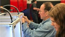 Participants prepare 3D mockups during one of the challenges at Marine Corps Systems Command’s Marine Maker Training course, Feb. 27 to March 3, aboard Marine Corps Base Quantico. The training exposes employees to emerging capabilities essential to solving future Marine needs. During the training, participants used laser cutters, 3D printers, computers, software and other tools to complete daily challenges with guidance from trained experts on the use of the systems. (Courtesy photo by Brad Halsey)