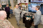 Defense Logistics Agency Aviation Commander Air Force Brig. Gen. Allan Day talks with Victor Champagne, U.S. Army Research Laboratory's Advanced Materials and Processes team leader, during a facilities tour at Aberdeen Proving Ground, Maryland, Feb. 23, 2017.