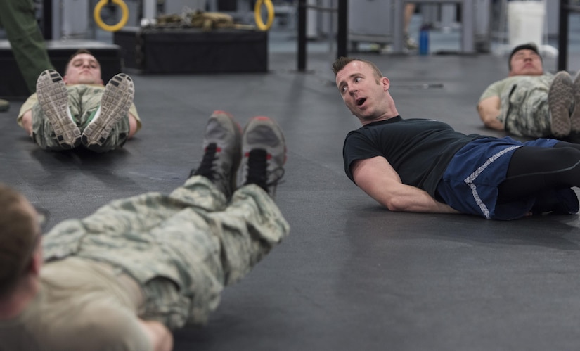 Staff Sgt. Brian Sollis, 811th Security Forces Squadron executive aircraft security member and instructor, leads an exercise during Fly-Away Security Team training, nicknamed “Pre-Raven,” at Joint Base Andrews, Md., Feb. 24, 2017. This quarterly-held course determines whether applicants can perform the Raven mission of providing discrete, low‐visibility security that ensures protection for Air Force aircraft transiting airfields where security is unknown or deemed inadequate to counter local threats. This includes training in the realm of teamwork, leadership, legal considerations, Redman qualification fights, baton maneuvers and verbal judo. (U.S. Air Force photo by Senior Airman Jordyn Fetter)