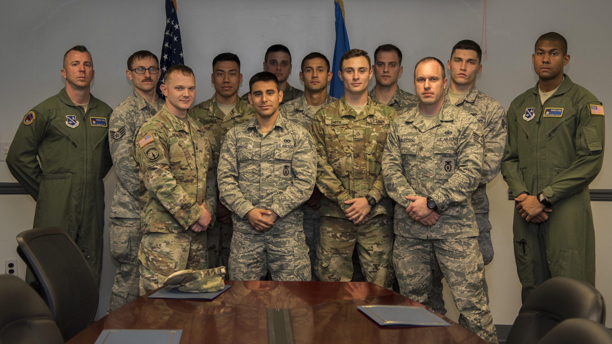 Fly-Away Security Team graduates and instructors pose for a photo at Joint Base Andrews, Md., March 2, 2017.  Fly-Away Security Team training, nicknamed “Pre-Raven,” lasted for three weeks and included training about legal considerations, Redman qualification, baton maneuvers and verbal judo. (U.S. Air Force photo by Airman 1st Class Valentina Lopez)