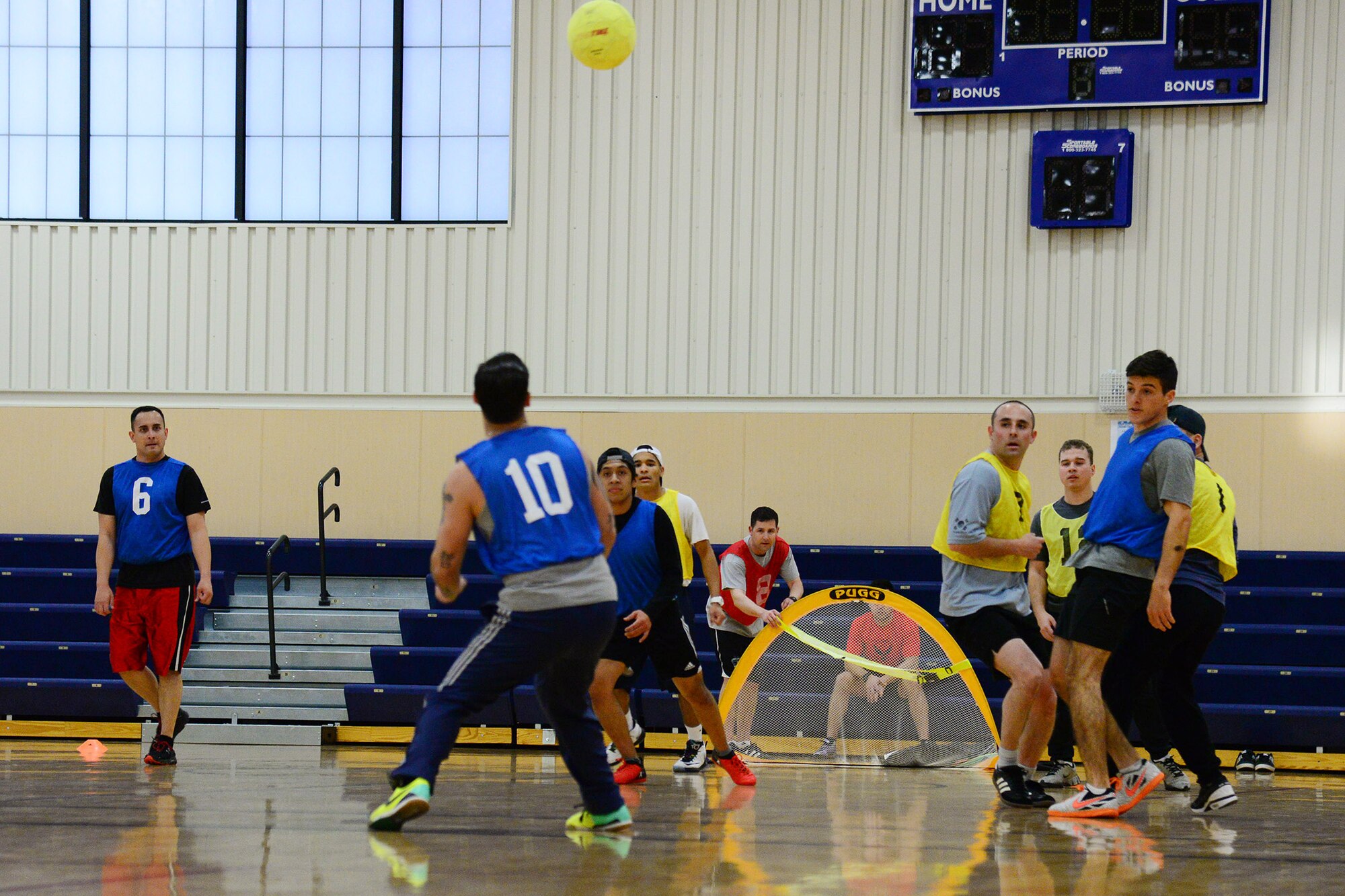 Airmen play indoor soccer at the fitness center Feb. 24, 2017, at Malmstrom Air Force Base, Mont. The goal of indoor soccer is to build camaraderie between Airmen, learn about one another and form enough teams to compete in squadron intramural indoor and outdoor soccer. (U.S. Air Force photo/Airman 1st Class Magen M. Reeves)