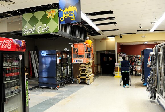 The old Commissary bread section is emptied and the surrounding walls have been removed March 1, 2017, at Columbus Air Force Base, Mississippi. The location has been marked as the new permanent location of the sushi bar, the Grab and Go drink and sandwich coolers, and a brand new rotisserie chicken stand, right outside the self-checkouts. (U.S. Air Force photo by Senior Airman Kaleb Snay)