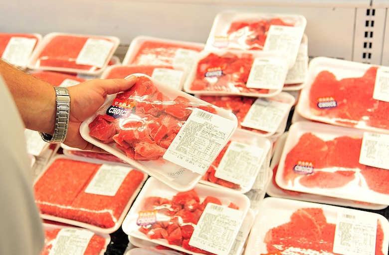 Bobby Couch, 14th Operations Support Squadron Air Traffic Controller, examines options in the meat aisle March 1, 2017, at Columbus Air Force Base, Mississippi. Along with the changes to the refrigeration units, the Commissary will receive new floor and ceiling tiles all across the store and a new paint scheme on the walls. (U.S. Air Force photo by Senior Airman Kaleb Snay)