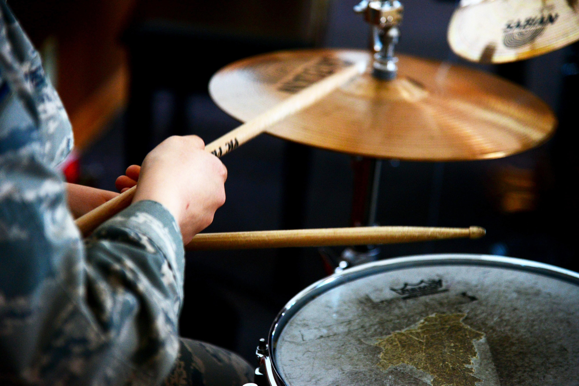 Airman 1st Class Yoli Alvarez Hernandez, 341st Medical Operations Squadron mental health technician, beats on a cymbal Feb. 28, 2017, at the base chapel at Malmstrom Air Force Base, Mont. Alvarez Hernandez is a self-taught drummer. (U.S. Air Force photo/Airman 1st Class Magen M. Reeves)
