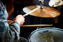 Airman 1st Class Yoli Alvarez Hernandez, 341st Medical Operations Squadron mental health technician, beats on a cymbal Feb. 28, 2017, at the base chapel at Malmstrom Air Force Base, Mont. Alvarez Hernandez is a self-taught drummer. (U.S. Air Force photo/Airman 1st Class Magen M. Reeves)
