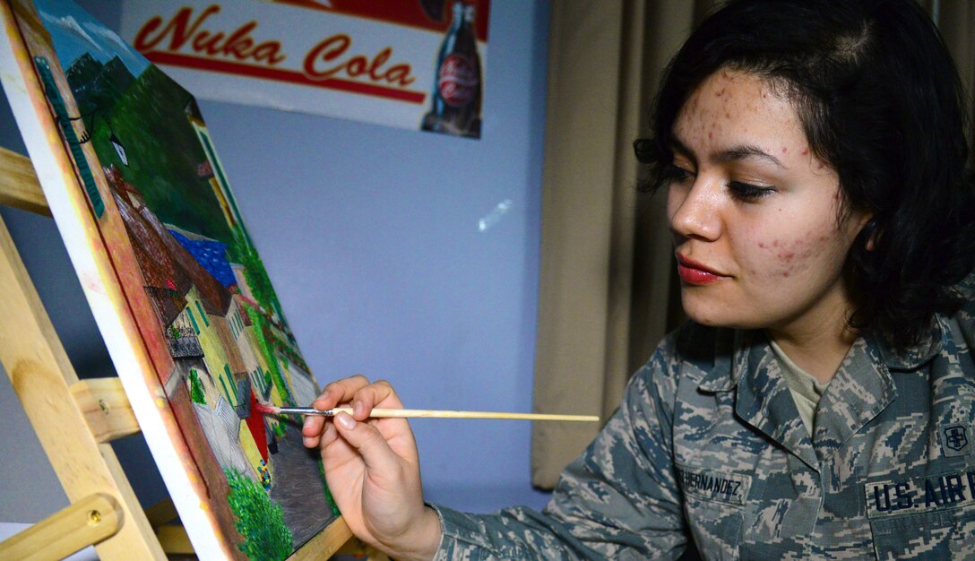 Airman 1st Class Yoli Alvarez Hernandez, 341st Medical Operations Squadron mental health technician, paints a picture Feb. 28, 2017, at the dorm complex at Malmstrom Air Force Base, Mont. Alvarez Hernandez creates both acrylic and oil illustrations in her spare time. (U.S. Air Force photo/Airman 1st Class Magen M. Reeves)