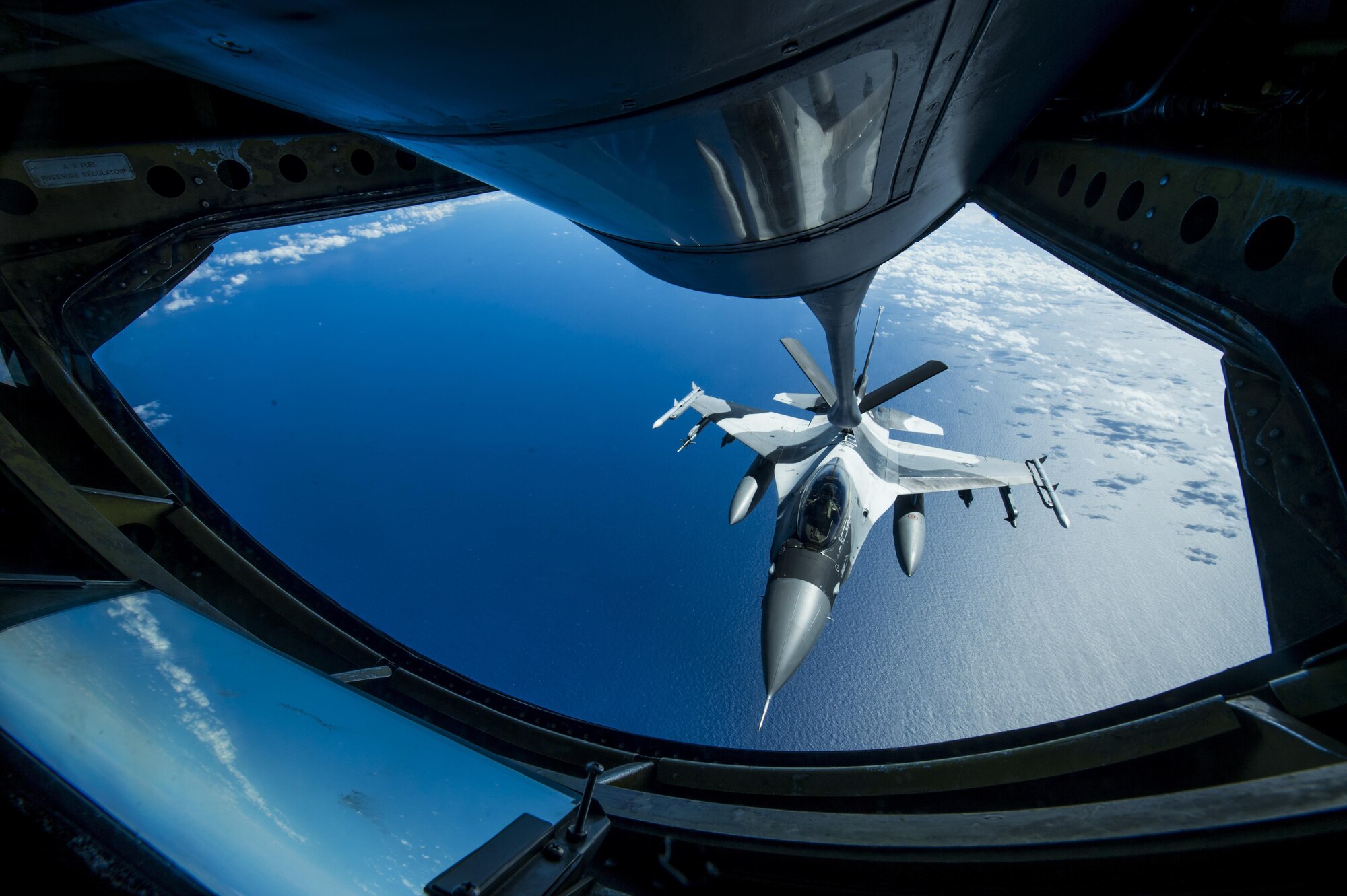 A U.S. Air Force F-16 Fighting Falcon assigned to the 18th Aggressor Squadron receives in-flight fuel from a U.S. Air Force KC-135 Stratotanker during Cope North 17, March 2, 2017. The exercise includes 22 total flying units and more than 2,700 personnel from three countries and continues the growth of strong, interoperable relationships within the Indo-Asia-Pacific region through integration of airborne and land-based command and control assets. (U.S. Air Force photo by Staff Sgt. Keith James)