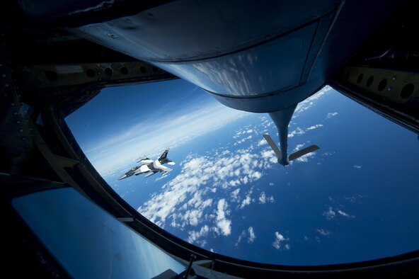 A U.S. Air Force F-16 Fighting Falcon assigned to the 18th Aggressor Squadron banks right after recieving in-flight fuel from a U.S. Air Force KC-135 Stratotanker during Cope North 17, March 2, 2017. The exercise includes 22 total flying units and more than 2,700 personnel from three countries and continues the growth of strong, interoperable relationships within the Indo-Asia-Pacific region through integration of airborne and land-based command and control assets. (U.S. Air Force photo by Staff Sgt. Keith James)