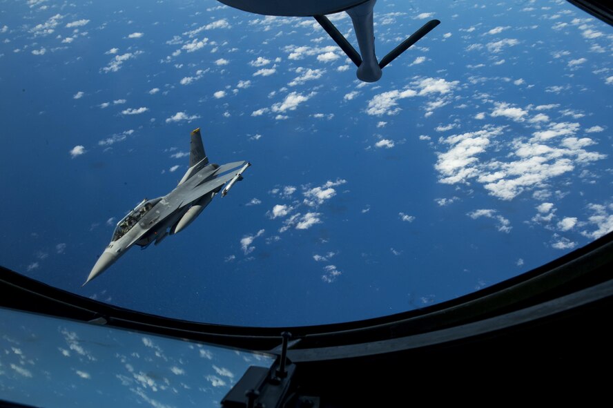 A U.S. Air Force F-16 Fighting Falcon assigned to the 14th Fighter Squadron banks right after recieving in-flight fuel from a U.S. Air Force KC-135 Stratotanker during Cope North 17, March 2, 2017. The exercise includes 22 total flying units and more than 2,700 personnel from three countries and continues the growth of strong, interoperable relationships within the Indo-Asia-Pacific region through integration of airborne and land-based command and control assets. (U.S. Air Force photo by Staff Sgt. Keith James)