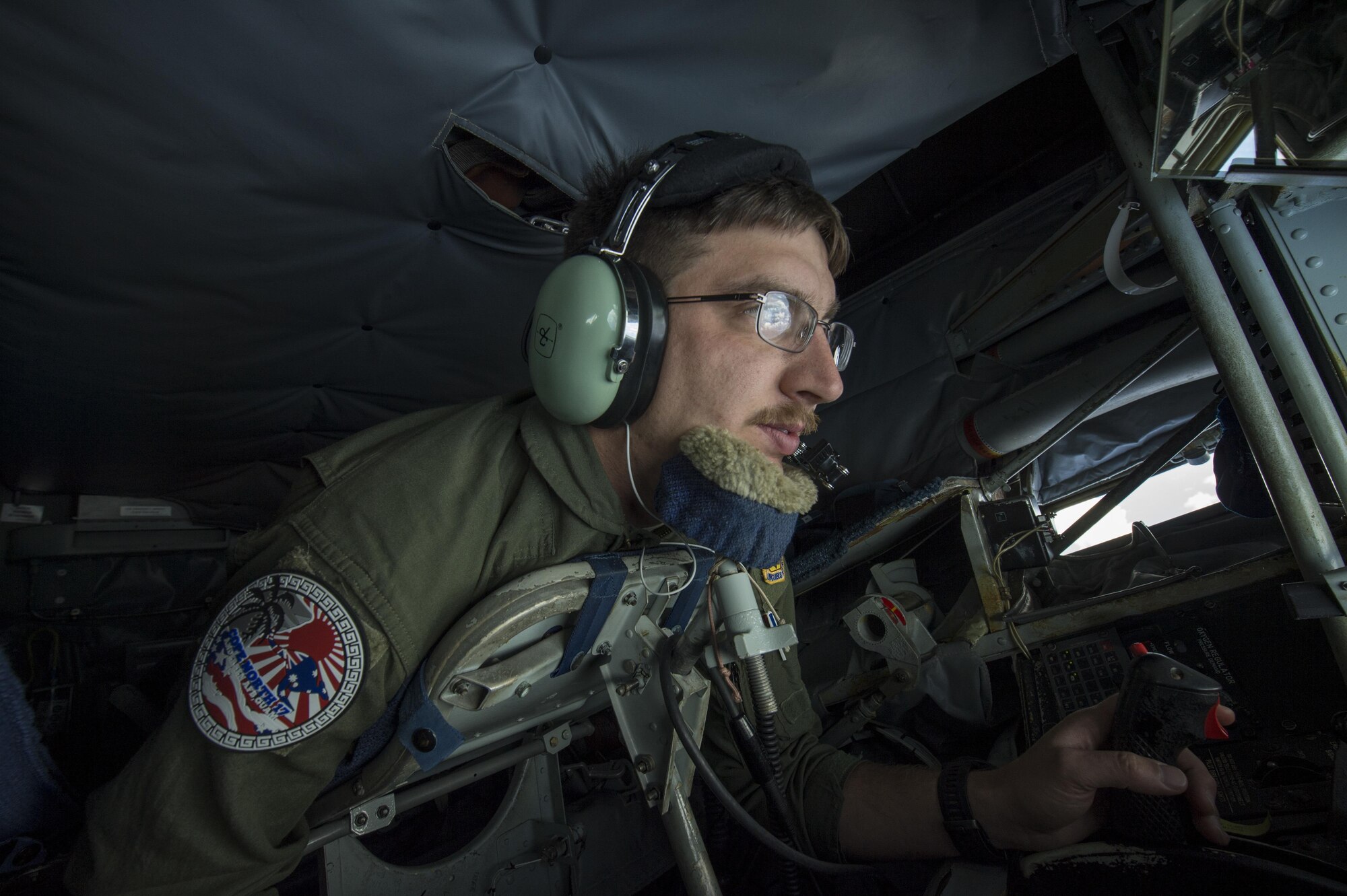 U.S. Air Force Staff Sgt. Jeremy Culliton, 909th Aerial Refueling Squadron instructor boom operator, refuels an F-16 Fighting Falcon assigned to the 14th Fighter Squadron during Cope North 17, March 2, 2017. The exercise includes 22 total flying units and more than 2,700 personnel from three countries and continues the growth of strong, interoperable relationships within the Indo-Asia-Pacific region through integration of airborne and land-based command and control assets. (U.S. Air Force photo by Staff Sgt. Keith James)