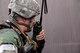 Staff Sgt. Bradley Booker, 51st Security Forces member, searches an area during a simulated kidnapping of the wing commander as part of Exercise Beverly Herd 17-1 at Osan Air Base, Republic of Korea, March 3, 2017. Defenders verified the suspect vehicle and searched the perimeter of the building where the vehicle was found. (U.S. Air Force photo by Airman 1st Class Gwendalyn Smith)