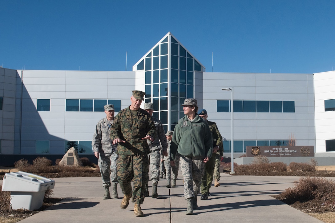 Marine Corps Gen. Joe Dunford, chairman of the Joint Chiefs of Staff, speaks to Air Force Gen. Lori J. Robinson, commander of U.S. Northern Command, while departing North American Aerospace Defense Command and Northcom Headquarters at Peterson Air Force Base, Colo., March 1, 2017. DoD photo by D. Myles Cullen