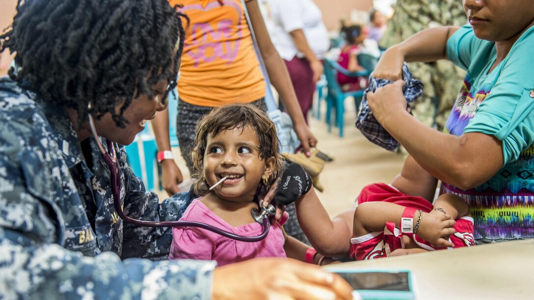 Navy Lt. j.g. Rochelle Bailey checks the vital signs of a Honduran patient during Continuing Promise 2017, a humanitarian mission, in Trujillo, Honduras, Feb. 25, 2017. Navy photo by Petty Officer 2nd Class Shamira Purifoy