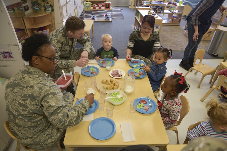 Parents and children eat green eggs and ham for breakfast in celebration of Read Across America at Misawa Air Base, Japan, March 2, 2017. March 2 is Read Across America, a day devoted to inspiring children to read. It is also Dr. Seuss’s birthday, the well-known children’s author. (U.S. Air Force photo by Staff Sgt. Melanie A. Hutto)