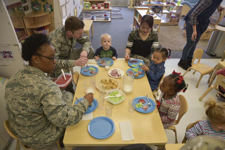 Parents and children eat green eggs and ham for breakfast in celebration of Read Across America at Misawa Air Base, Japan, March 2, 2017. March 2 is Read Across America Day, devoted to inspiring children to read. It is also Dr. Seuss’s birthday, the well-known children’s author. (U.S. Air Force photo by Staff Sgt. Melanie A. Hutto)