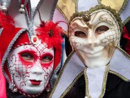 Two masqueraded people pose for a photo during fasching, a festival held across Europe, in the city of Ramstein, Germany, Feb. 28, 2017. Fasching is a time of festivity and merry making—a time where common place people take a chance to free themselves for personal expression and celebration. (U.S. Air Force photo by Senior Airman Lane T. Plummer)