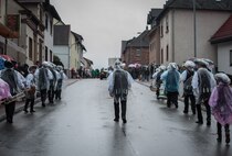 Musical performers march in a parade during fasching, a festival held across Europe, in the city of Ramstein, Germany, Feb. 28, 2017. Often throughout these festivals is loud music played by dozens of groups parading through the streets. (U.S. Air Force photo by Senior Airman Lane T. Plummer)