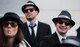 Members of a parade group called “Men in Black” walk through a parade during fasching, a festival held across Europe, in the city of Ramstein, Germany, Feb. 28, 2017. People who celebrate often dress up as pop culture figures and politicians. (U.S. Air Force photo by Senior Airman Lane T. Plummer)