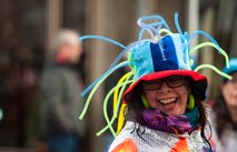 A woman laughs as she marches through a parade during fasching, a festival held across Europe, in the city of Ramstein, Germany, Feb. 28, 2017. Fasching is Germany’s carnival season. It starts on the 11th day of November at exactly 11 minutes after 11 am and ends at the stroke of midnight on Shroud Tuesday—often referred to as Fat Tuesday. (U.S. Air Force photo by Senior Airman Lane T. Plummer)