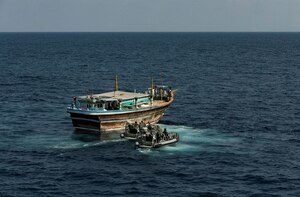 A visit, board, search and seizure (VBSS) team from the Royal Australian Navy Anzac-class frigate HMAS Arunta (FFH 151) prepare to board a suspicious fishing dhow. Arunta seized more than 800 kg of hashish while conducting maritime security operations in the Arabian Sea, March 2. The ANZAC-class frigate made the seizure as part of Combined Task Force (CTF) 150, which was the first intercept of narcotics since December. The Canadian-led CTF 150 is one of three task forces under the U.S.-led Combined Maritime Forces (CMF). 