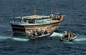 A visit, board, search and seizure (VBSS) team from the Royal Australian Navy Anzac-class frigate HMAS Arunta (FFH 151) prepare to board a suspicious fishing dhow. Arunta seized more than 800 kg of hashish while conducting maritime security operations in the Arabian Sea, March 2. The ANZAC-class frigate made the seizure as part of Combined Task Force (CTF) 150, which was the first intercept of narcotics since December. The Canadian-led CTF 150 is one of three task forces under the U.S.-led Combined Maritime Forces (CMF). 