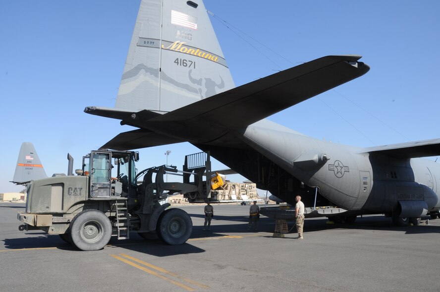737th Expeditionary Airlift Squadron Airmen load a C-130H Hercules at an undisclosed location in Southwest Asia Feb. 8, 2017. The mission of the 737th EAS is to deliver personnel and cargo downrange in support of Operation Inherent Resolve. (U.S. Air Force photo/Tech. Sgt. Kenneth McCann)