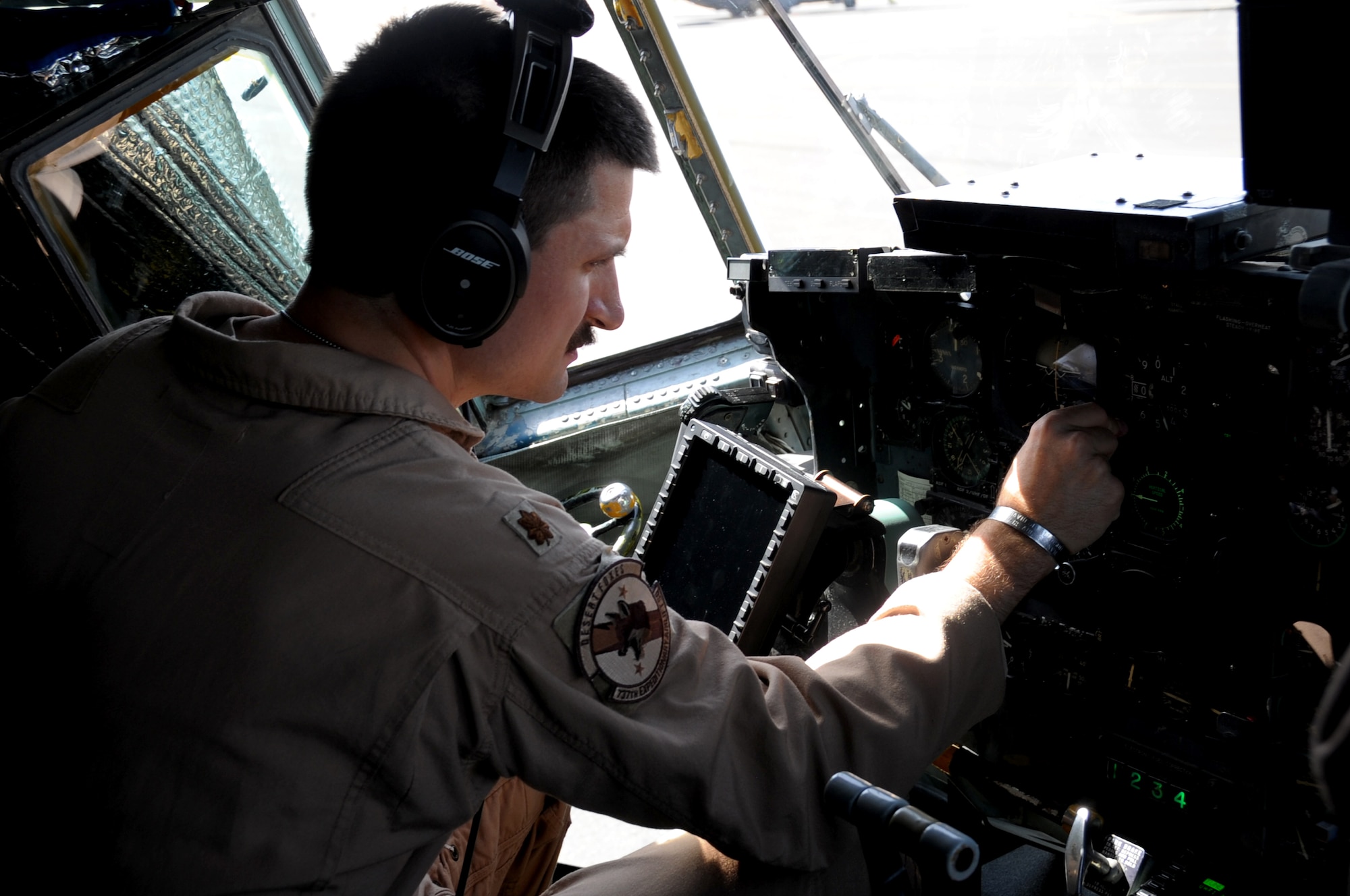 Maj. Cody Burroughs, 737th Expeditionary Airlift Squadron pilot, performs preflight inspections in a C-130H Hercules Feb. 28, 2017 at an undisclosed location in Southwest Asia. The mission of the 737th is to deliver personnel and cargo downrange in support of Operation Inherent Resolve. (U.S. Air Force photo/Tech. Sgt. Kenneth McCann)