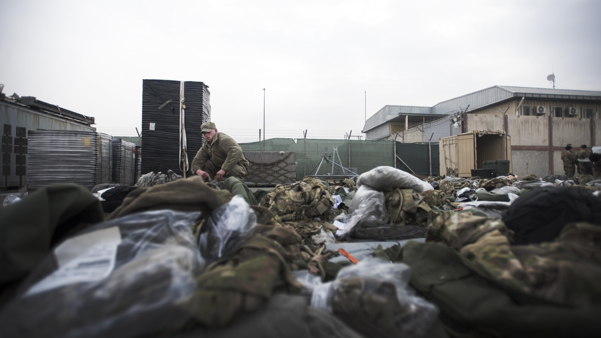 Senior Airman Cam Manson, Central Command Material Recovery Element air transportation specialist, inspects equipment being shipped to the U.S. Feb. 14, 2017 at Hamid Karzai International Airport, Kabul. CMRE members travel around Afghanistan recovering U.S. military equipment for shipment back to the U.S. or enduring bases in country. (U.S. Air Force photo by Staff Sgt. Katherine Spessa)