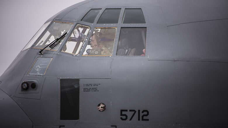 Capt. Andy Edmund, 774th Expeditionary Airlift Squadron C-130J Hercules pilot, goes through a pre-flight checklist during a stop at Camp Bastion---, Afghanistan, Feb. 17, 2017. The 774th EAS provides tactical airlift, including aeromedical evacuation, cargo and personnel airlift and airdrop, and any intra-theater transportation needed to support a successful train, advise, assist mission in Afghanistan. (U.S. Air Force photo by Staff Sgt. Katherine Spessa)