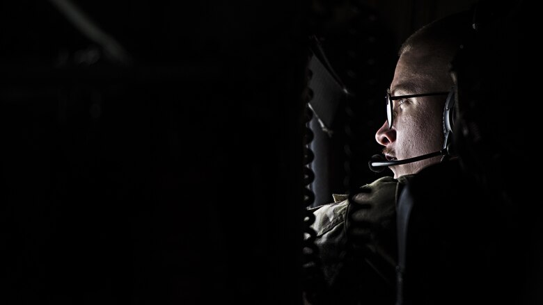 Senior Airman Brandon King, 774th Expeditionary Airlift Squadron loadmaster, checks for ice on the wings of a C-130J Hercules during a flight from Camp Bastion to Kandahar Airfield, Afghanistan, Feb. 17, 2017. The 774th EAS provides tactical airlift capabilities in the Afghan theater which often require non-standard or outsized cargo and personnel movement. (U.S. Air Force photo by Staff Sgt. Katherine Spessa)