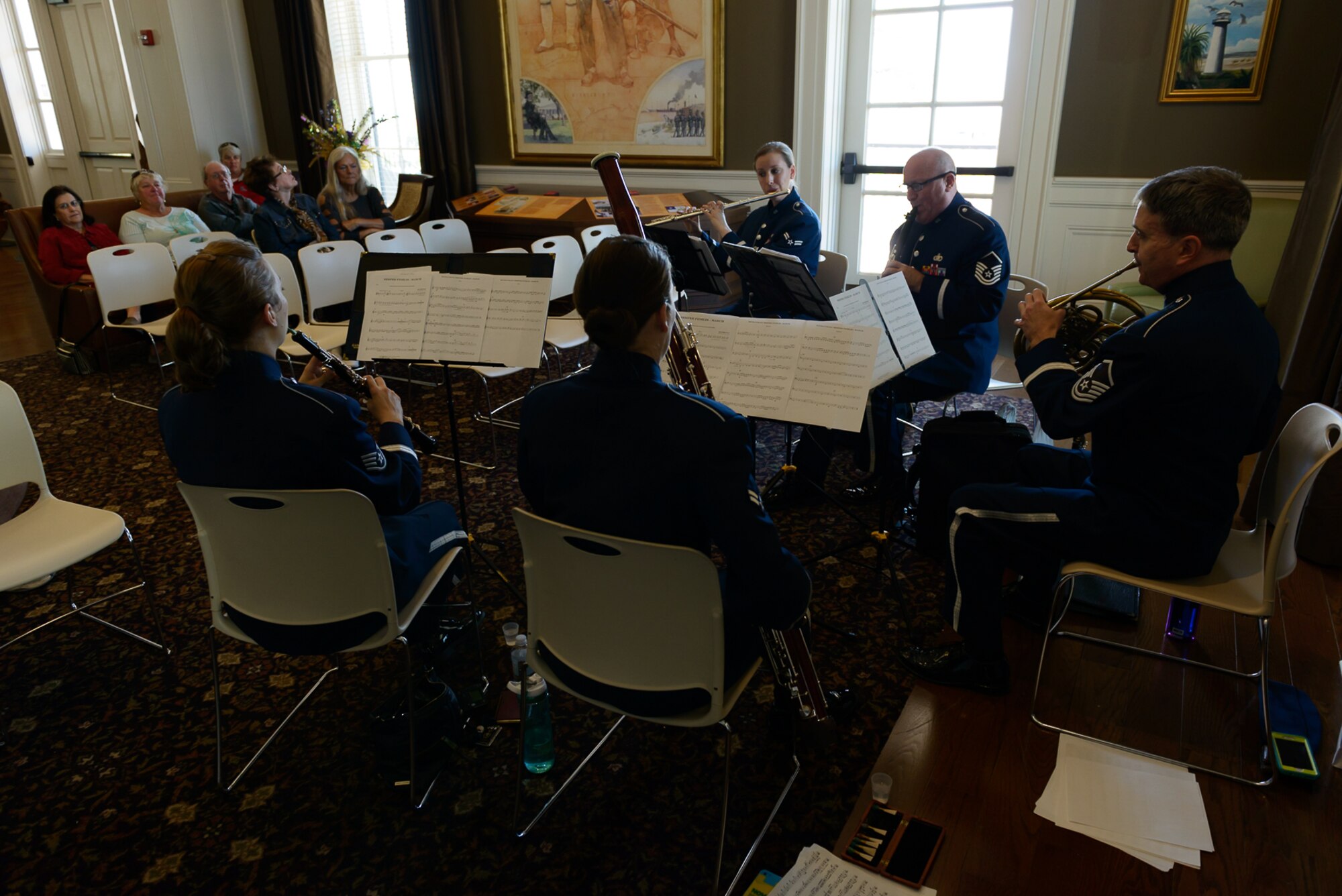 U.S. Air Force Band of the West, Spectrum Winds Quintet ensemble members preforms for Gulf Coast residents and travelers at the Biloxi Visitor's Center Feb. 26, 2017 Biloxi, Miss.  The group played a medley of concert and ceremonial marching music for the attendees. (U.S. Air Force photo by Andre' Askew)