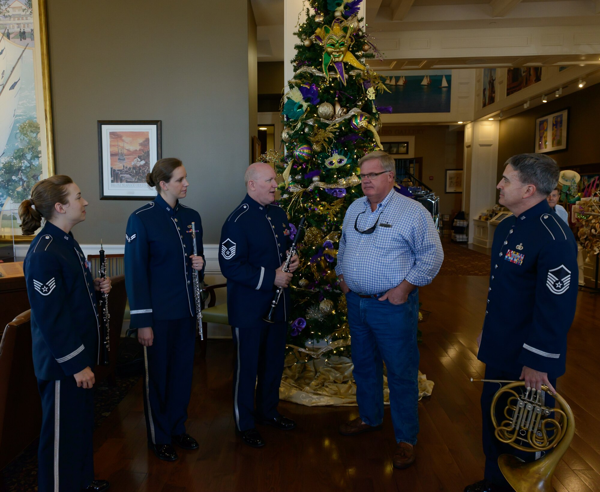 Band of the West, Spectrum Winds Quintet members speaks to Gulf Coast residents and travelers at the Biloxi Visitor's Center Feb. 26, 2017 Biloxi, Miss. The group played a medley of concert and ceremonial marching music for the attendees. (U.S. Air Force photo by Andre' Askew)