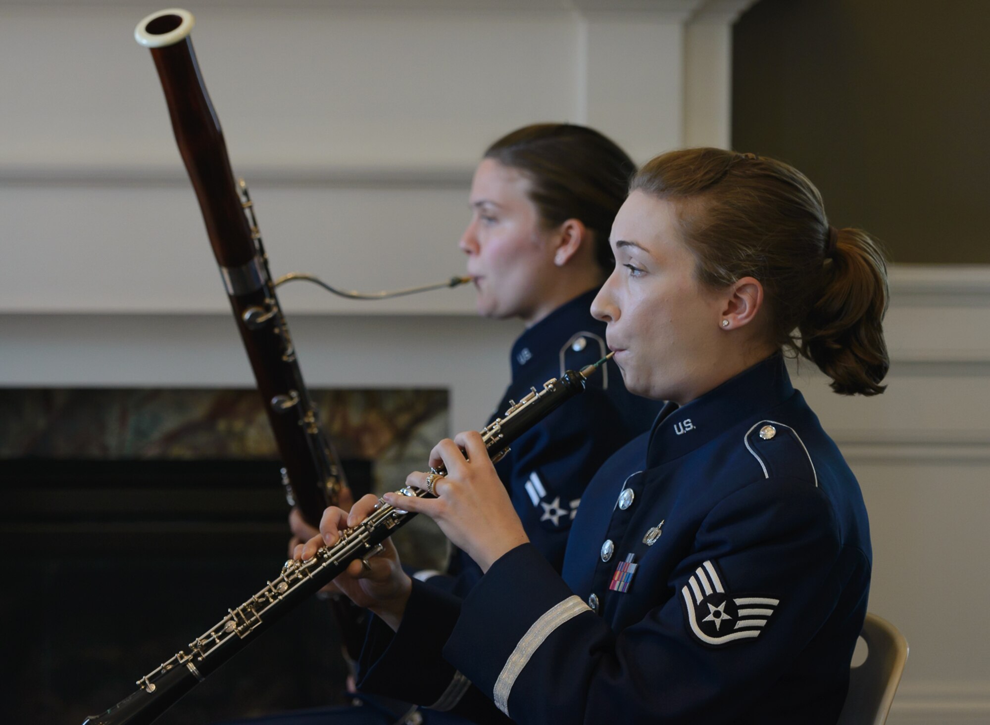 Staff Sgt. Kathleen Keese, Band of the West oboist, and Airman 1st Class Laura McIntyer, Band of the West bassoonist, preform for Gulf Coast residents and travelers at the Biloxi Visitor's Center Feb. 26, 2017 Biloxi, Miss. Members of the Spectrum Winds Quintet, an ensemble of the Band of the West, played a medley of concert and ceremonial marching music for the attendees. (U.S. Air Force photo by Andre' Askew)