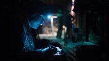 Capt. Alex Bedard, 455th Expeditionary Aeromedical Evacuation Squadron Critical Care Air Transport Team doctor, takes notes aboard a C-130J Hercules while transporting a patient from Kandahar Airfield to Bagram Airfield, Afghanistan, Feb. 22, 2017. Members of the 455th EAES transport critically ill or injured patients from austere locations throughout Afghanistan to receive a higher level of care. (U.S. Air Force photo by Staff Sgt. Katherine Spessa)