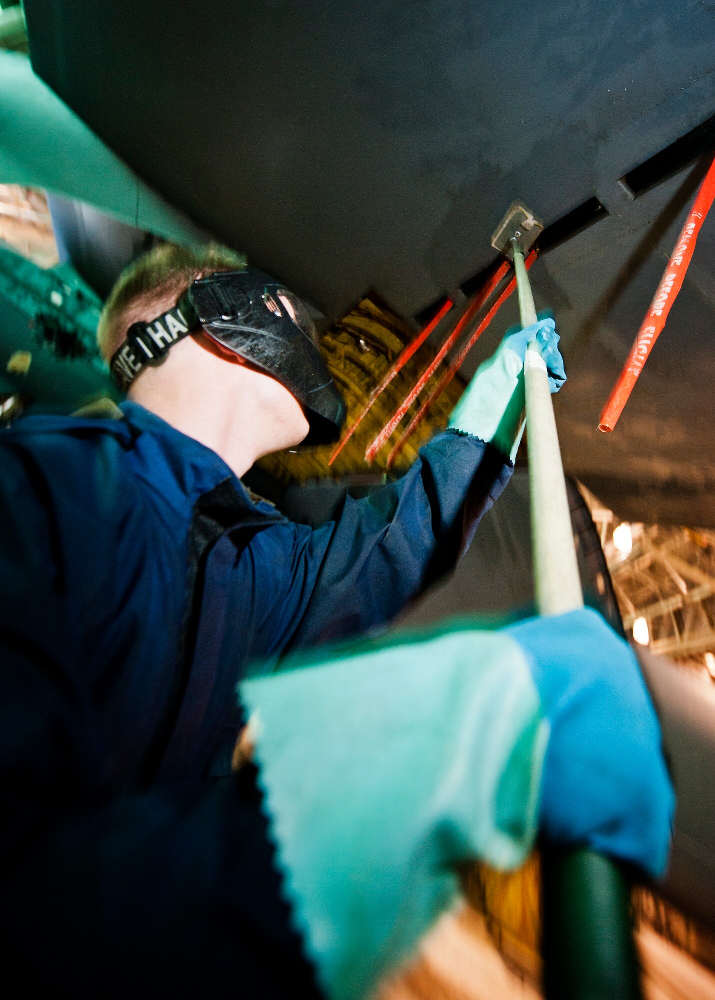 Airmen from the 5th Aircraft Maintenance Squadron wash a B-52H Stratofortress at Minot Air Force Base, N.D., Feb. 14, 2017. It takes the nine-Airman team two days and approximately 10 gallons of soap to wash each jet when it comes in for its routine wash every 120 days. (U.S. Air Force photo/Senior Airman J.T. Armstrong)